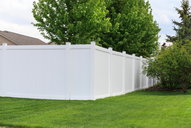 White vinyl fence completed installation